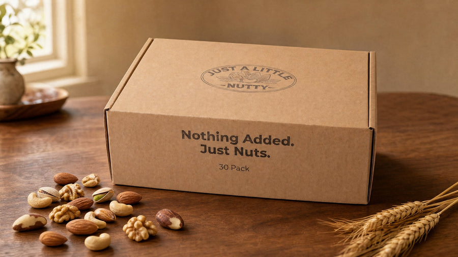 Just a Little Nutty 30-Pack box on a warm table with loose nuts